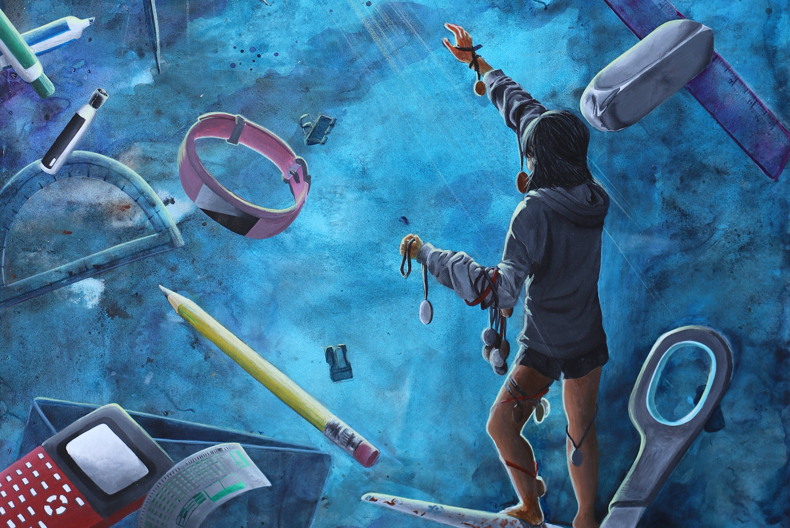 An artwork showing a young girl floating among school supplies and reaching for something bright in the distance