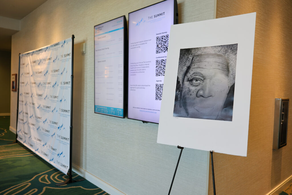 Artwork from the Texas Mental Health Creative Arts Contest on display at The Summit conference.